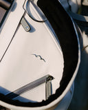 Close-up of a white Matchplay on a blurred background