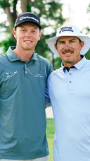 Joel Dahmen and Ryggs Johnston on a golf course getting ready to play a match