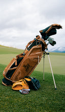 Sun Mountain x Marucci bag in black on a golf course with mountains in the background