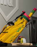 Zoomed out shot of the Victus Pencil bat in a Sun Mountain x Victus golf bag