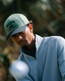 Person wearing a Golf State of Mind Hat and Coastal Quarter-Zip