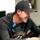 Joel Dahmen looking over custom designs with the Sun Mountain design team