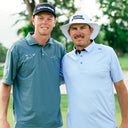 Ryggs Johnston and Joel Dahmen pose for a photo together before playing a round of golf