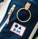 Close-up of a Hometown bag with a towel ring 