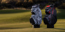 Two golf bags on the course